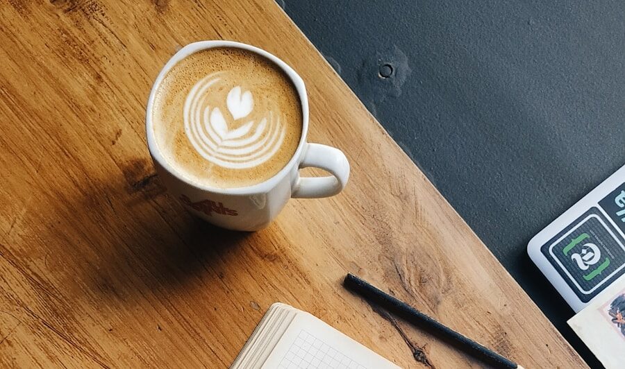 Photo by Melisa Hildt white ceramic mug on brown wooden table